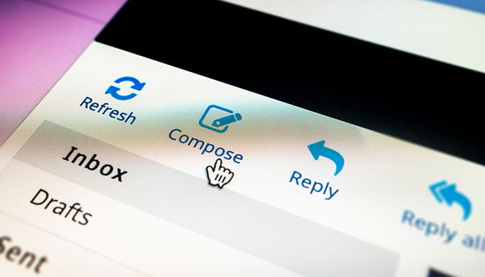 computer mouse hovering over "compose" email button